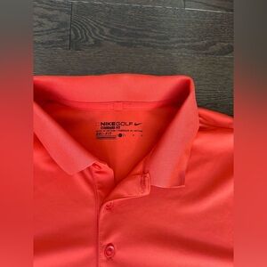 Nike Golf men’s shirt size Large in orange PTP is 22  athletic dry-fit shirt